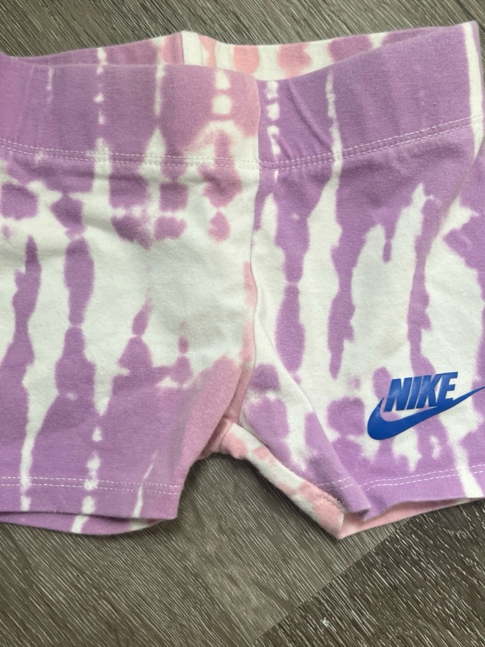 Nike Girls' Pink and White Tie-Dye Bike Shorts with Blue Logo